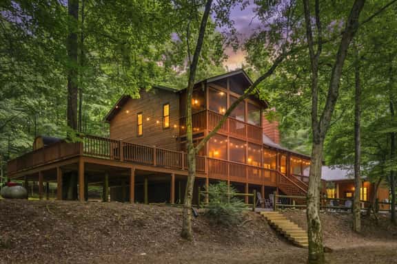 Riverfront Cabin: Hot Tub, Sauna, Arcade & Views - Image 1
