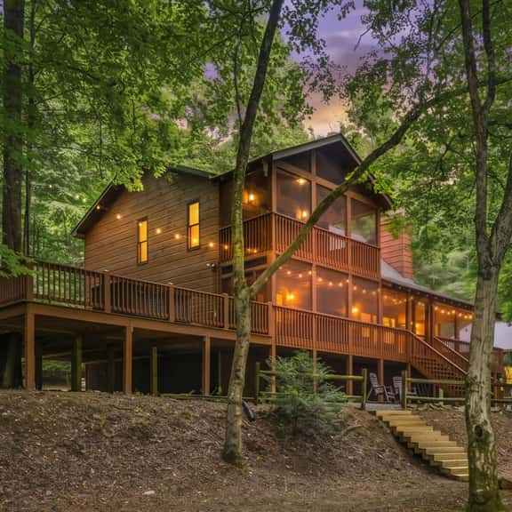 Riverfront Cabin: Hot Tub, Sauna, Arcade & Views - Image 1